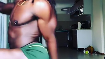 African American Man Performs Twerk With Large Breasts