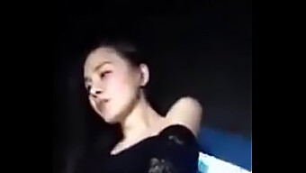 A Chinese Girl Performs A Strip Dance In A Nightclub